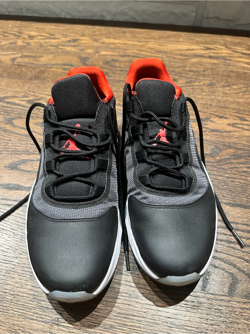 Nike Air Jordan 11 CMFT Low Bred sneakers in black and red